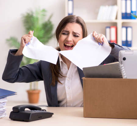 Dismissal and firing concept with woman employeeの写真素材