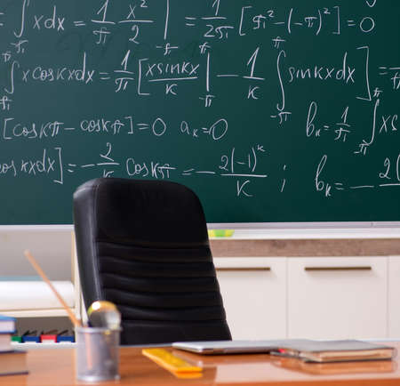 Funny male math teacher in the classroomの写真素材