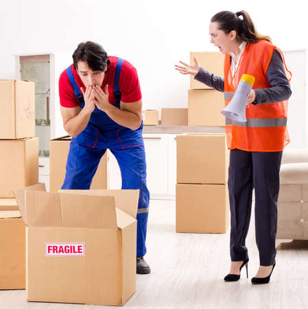Professional movers doing home relocationの写真素材