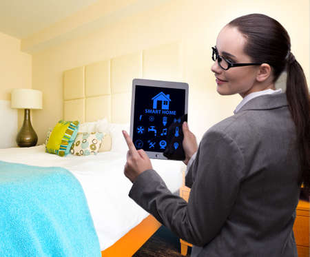 Smart home concept with womanの写真素材