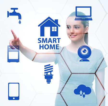 Smart home concept with womanの写真素材