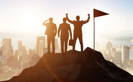 Businessmen in achievement and teamwork conceptの写真素材