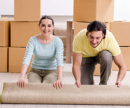 Young pair moving to new apaprtmentの写真素材