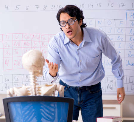 Young male chemist teacher and student skeletonの写真素材