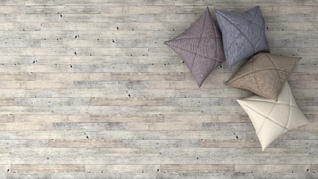 Stylish background with parquet and soft pillows, top view