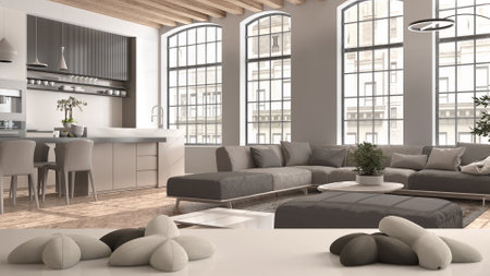 White table, desk or shelf with five soft white pillows in the shape of stars or flowers, over...