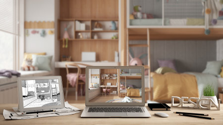 Architect designer desktop concept, laptop and tablet on wooden desk with screen showing interior design project and CAD sketch, blurred draft in the background, children bedroomの写真素材