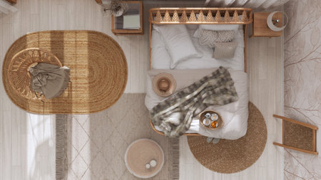 Boho chic farmhouse bedroom with rattan bed and wooden furniture in white and beige tones. Jute carpets. Vintage wallpaper, bohemian interior design. Top view, pan, aboveの写真素材