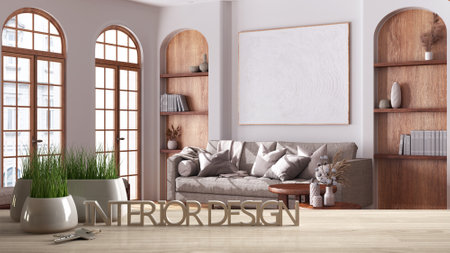 Wooden table, desk or shelf with potted grass plant, house keys and 3D letters making the words...