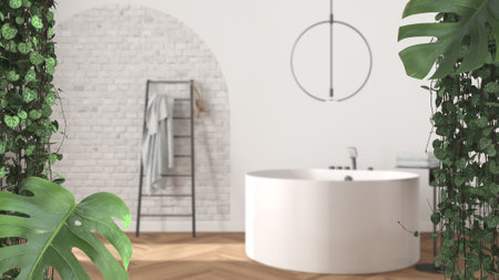 Jungle frame, biophilic concept idea interior design. Tropical leaves over minimal bathroom with round bathtub. Cerpegia woodii and monstera deliciosa plantsの写真素材