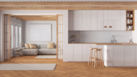 Blurred background, minimal japandi kitchen and living room. Fabric sofa and island, paper sliding door and herringbone parquet. Clean interior designの写真素材