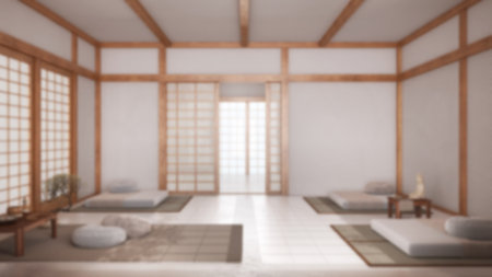 Blurred background, japandi meditation room with pillows, tatami mats and paper doors. Wooden beams and resin floor. Minimalist interior designの写真素材