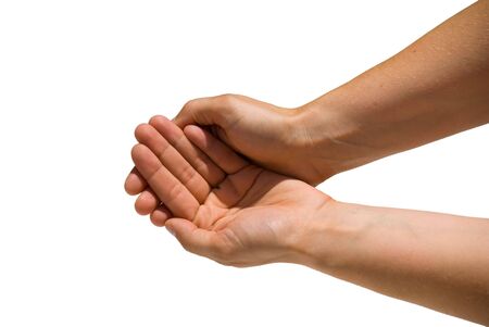 two hands forming an emptyness or protection gestureの写真素材