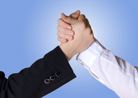 two business hands in rivalry or teamwork gestureの写真素材