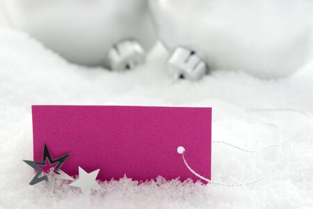 christmas decoration and a purple sign with copyspace build a christmas or winter backgroundの写真素材