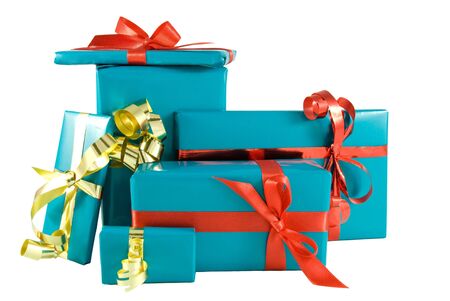 lots of blue gifts with red and gold ornamentation, on whiteの写真素材