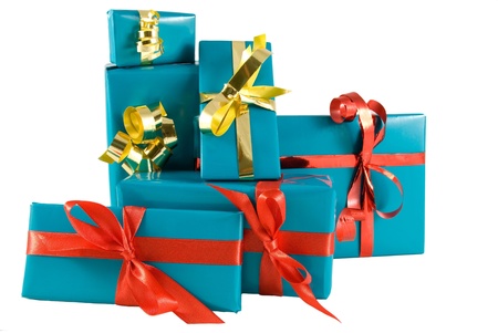 many blue presents with gold and red decorations, on whiteの写真素材