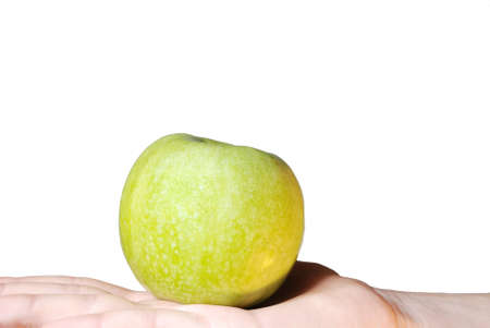 a hand holds an apple, on whiteの写真素材
