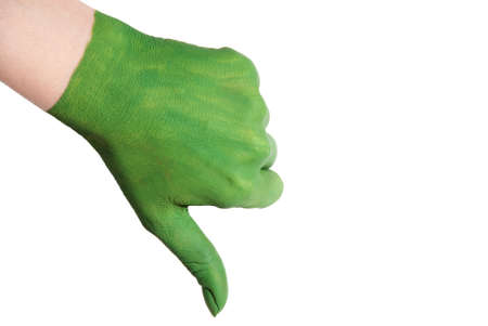 a green painted hand shows thumbs downの写真素材