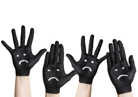 sad or angry hands, painted black, isolatedの写真素材