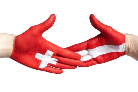 swiss-austrian handshake, isolated on whiteの写真素材