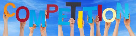 Many Caucasian People And Hands Holding Colorful  Letters Or Characters Building The English Word...