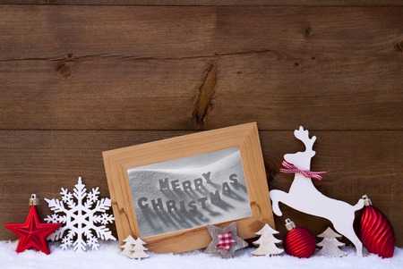 Christmas Card With Picture Frame On Snow. Englisch Text Merry Christmas. Red Christmas Decoration...
