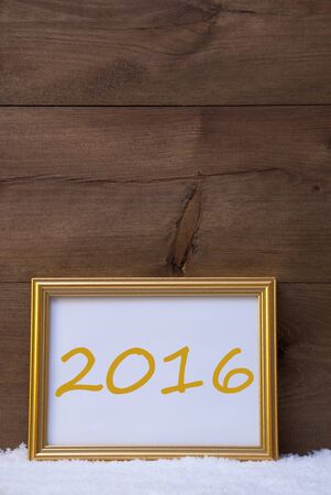 One Golden Retro Picture Frame On Snow. Christmas Card With English 2016 For Happy New Year. Rustic,...