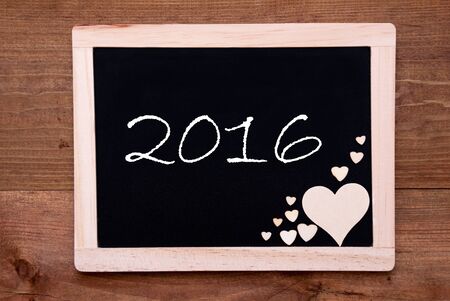 Blackboard With Text 2016. Brown Wooden Hearts. Wooden Background With Vintage, Rustic Or Retro Style.の写真素材
