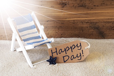 Sunny Summer Label With Sand And Aged Wooden Background. English Text Happy Day. Deck Chair For...