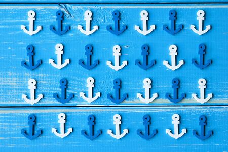 Blue Wooden Background With Anchors As Texture. Nautic Or Maritime Greeting Cardの写真素材
