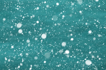 Blue Or Turquoise Wrapping Paper As Christmas Background Or Texture. Copy Space For Advertisement Or Your Free Text Here. Snowflakes For Winter Atmosphereの写真素材