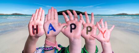 Children Hands Building Word Happy, Ocean Backgroundの写真素材
