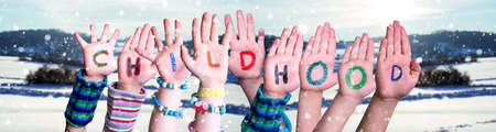 Children Hands Building Word Childhood, Snowy Winter Backgroundの写真素材