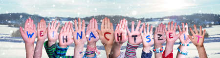 Children Hands Building Weihnachtszeit Means Christmas Time, Winter Background