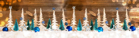Christmas Tree Banner, Blue Star And Ball, Brown Wooden Background, Snow, Bokehの写真素材