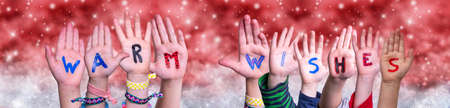 Children Hands Building Word Warm Wishes, Red Christmas Background