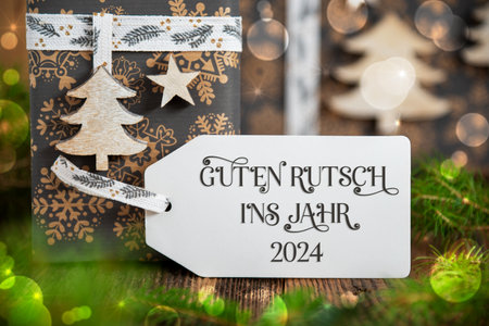 Text Guten Rutsch 2024, Means Happy 2024, With Winter Gifts,Christmas Backgroundの写真素材