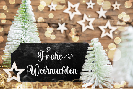Text Frohe Weihnachten, Means Merry Christmas, Rustic Christmas Tree Decorの写真素材
