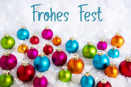 Text Frohes Fest, Means Happy Holidays, On Snow With Christmas Ballsの写真素材