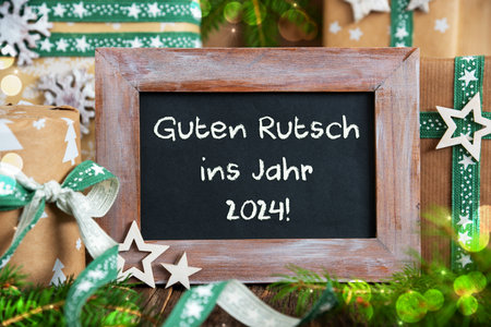 Text Guten Rutsch 2024, Means Happy 2024, With Sustainable Christmas Decorationの写真素材