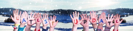 Children Hands Building Word Latest Update, Winter Backgroundの写真素材