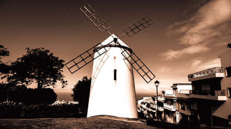 black and white view to a windmillの写真素材