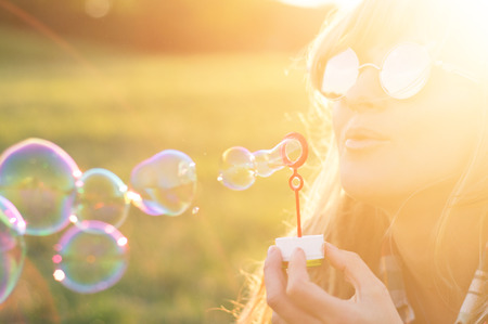 girl, portrait in the summer sun. colorful background
