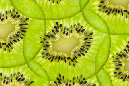 fresh juicy kiwi fruit. green backgroundの写真素材