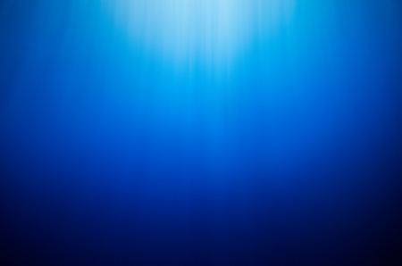 Abstract underwater deep blue backgroundsの写真素材