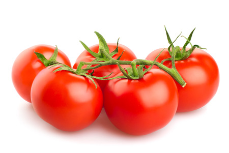 Fresh tomatoes isolated on white backgroundの写真素材