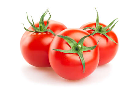 Fresh tomatoes isolated on white backgroundの写真素材