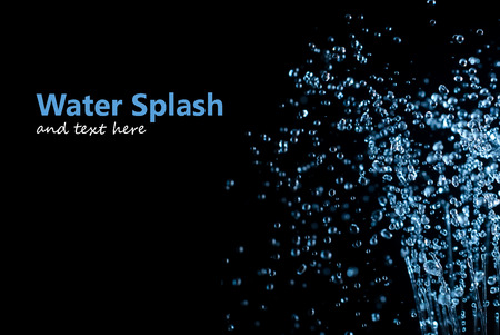 splash of water drops on a black backgroundの写真素材