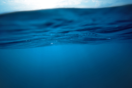 underwater, sea and sky split backgroundの写真素材